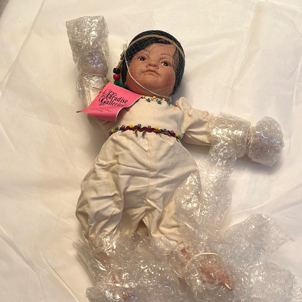 NWB Paradise Galleries THIS POCRELAIN DOLL.